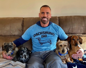 dr adam christman tiktok vet with his dachsund dogs